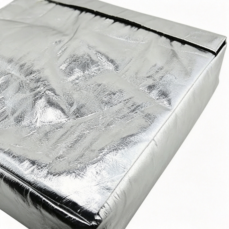 Varmereflekterende knæpude til svejsning af aluminiumsfolie