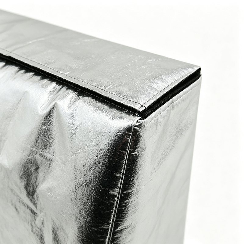 Varmereflekterende knæpude til svejsning af aluminiumsfolie
