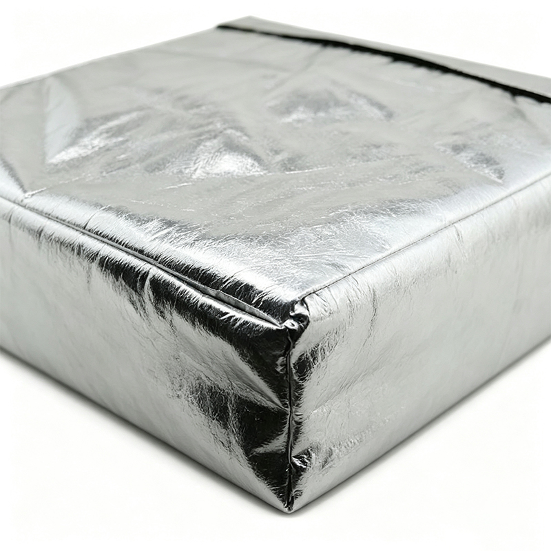 Varmereflekterende knæpude til svejsning af aluminiumsfolie