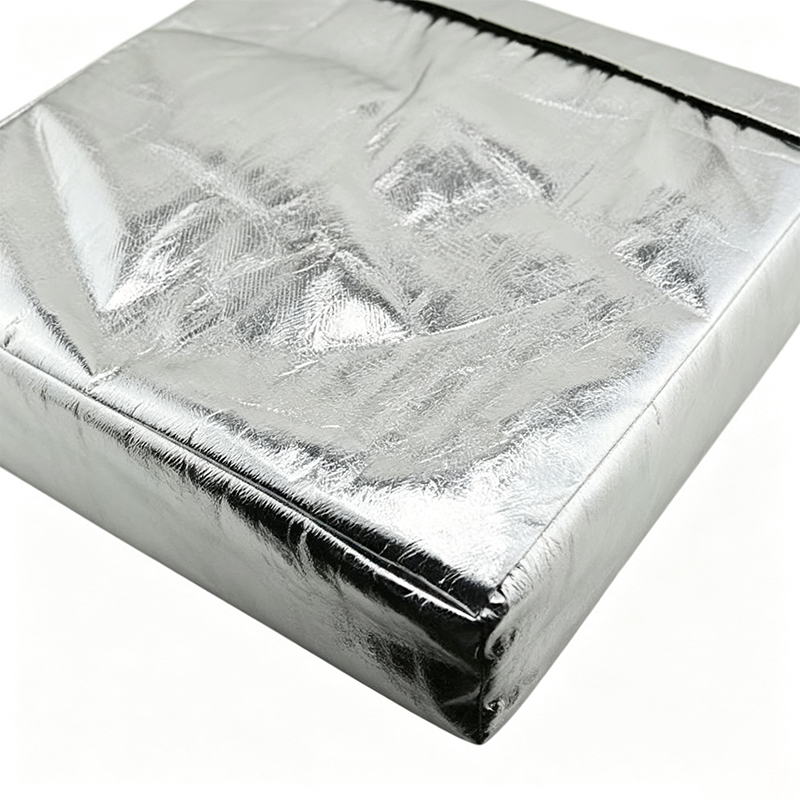 Varmereflekterende knæpude til svejsning af aluminiumsfolie